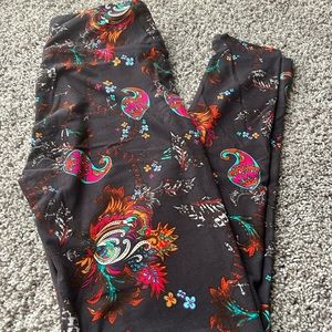 Brand new, never worn LuLaRoe leggings. Brown with vibrant paisley print!